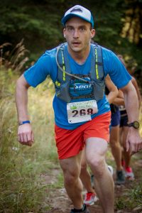 A picture of Robert climbing towards the top of Lord Hill, Summer 2019.