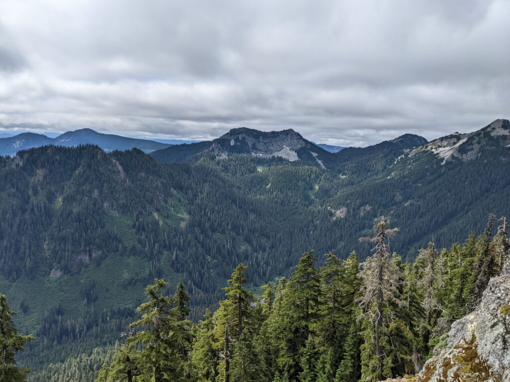 A picture of lush, green mountains and a cloudy sky